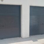 Pair of residential garage doors installed by Expert Garage Doors.