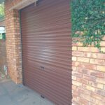 Residential garage door installed by Expert Garage Doors.