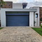 Residential garage door installed by Expert Garage Doors.