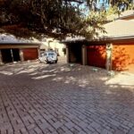 Apartment garage doors installed by Expert Garage Doors.