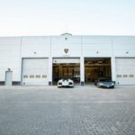 Commercial garage doors at a car dealership installed by Expert Garage Doors.