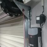 Close-up of roller shutter doors mechanism installed by Expert Garage Doors.