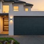 Residential house with a garage door installed by Expert Garage Doors.