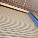 Residential garage roller shutter doors installed by Expert Garage Doors.