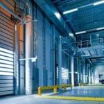 Inside view of warehouse roller shutter doors installed by Expert Garage Doors.