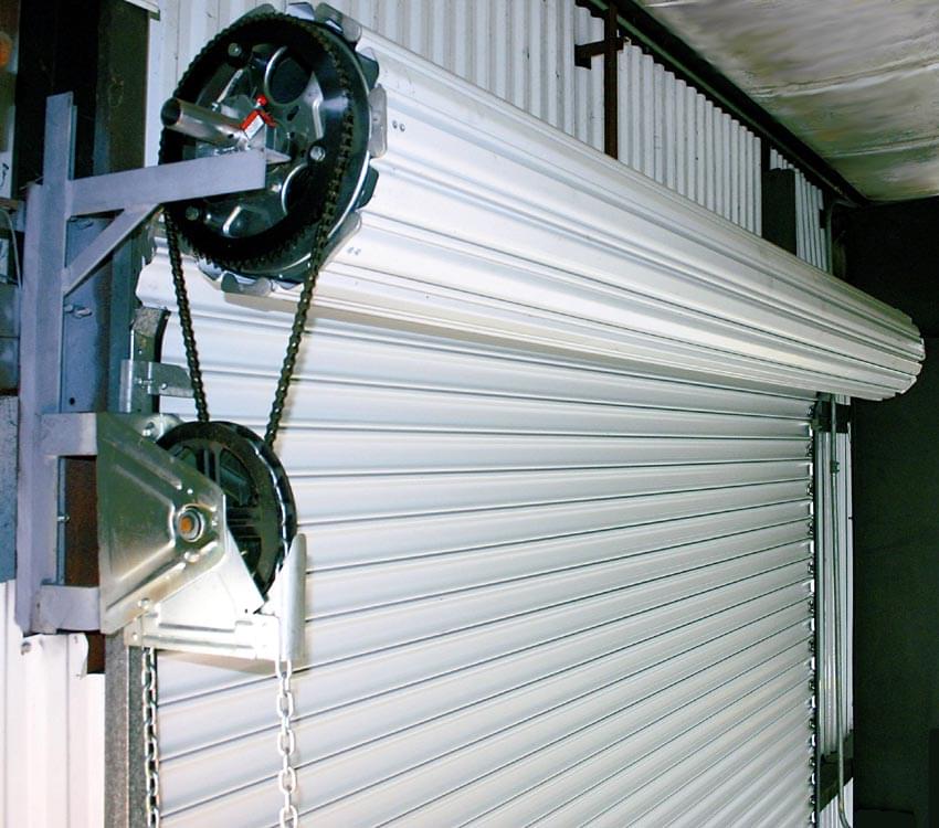 Inside view of roller shutter doors installed by Expert Garage Doors.